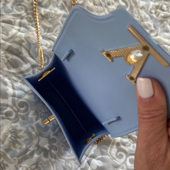 Blue crossbody with gold chain
So cute. Worn once - Picture 3 of 4